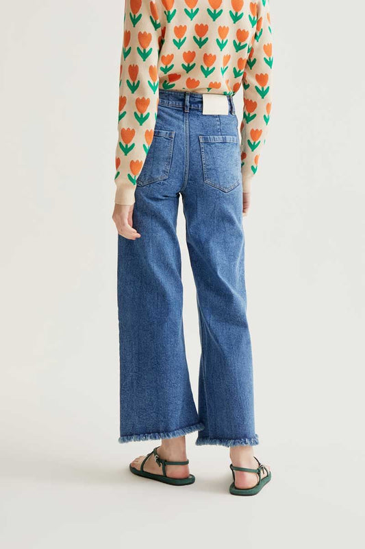 Blue Jeans With Raw-Cut Bottom