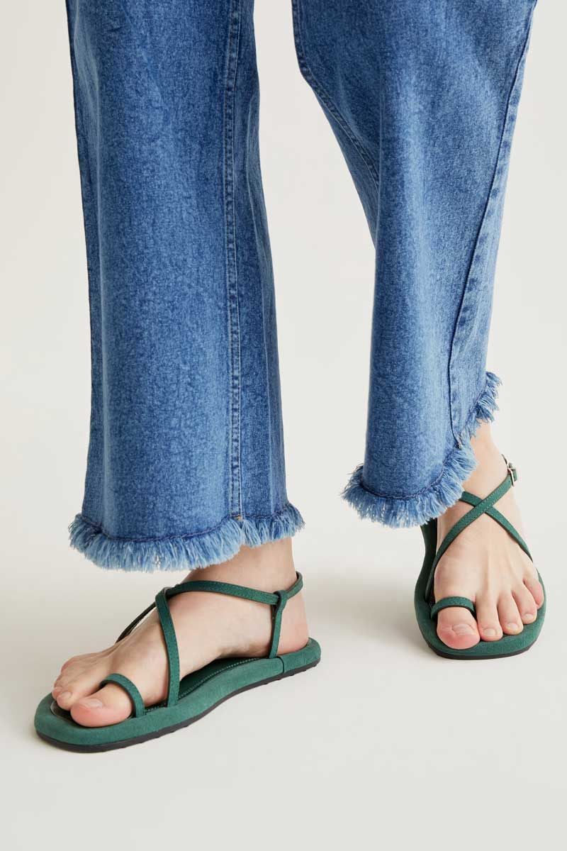 Blue Jeans With Raw-Cut Bottom