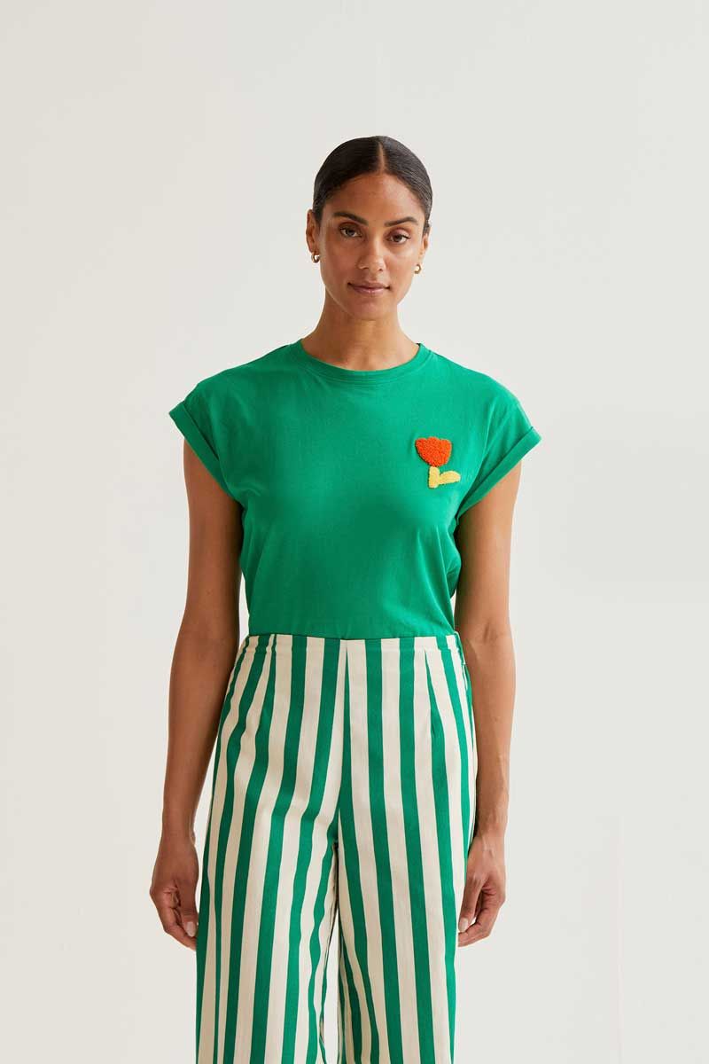 Green T-shirt with red tulip embroidery